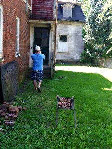 A picture of Chris taking a picture, while he ignores the signs.
